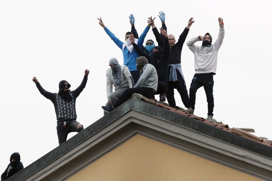 Inmates stage a protest against new rules to cope with coronavirus emergency